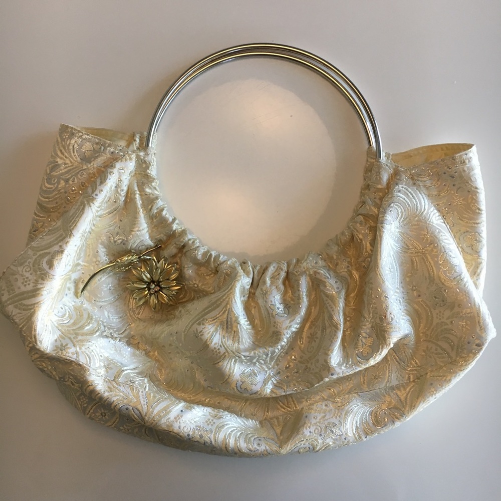 Handbag with hoop handles